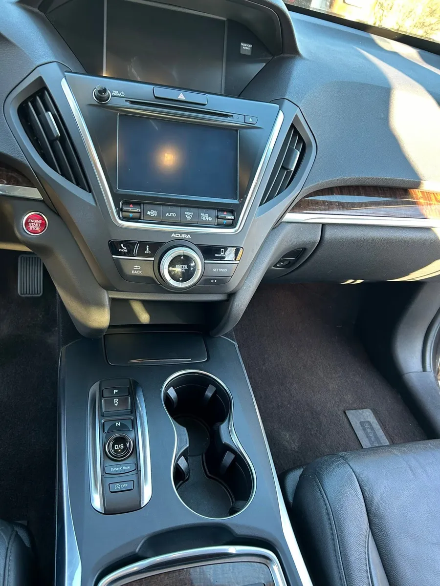 Acura MDX console after detailing