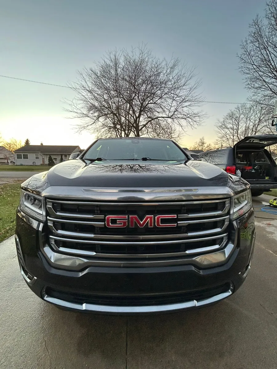 Black GMC Acadia front after an exterior detail