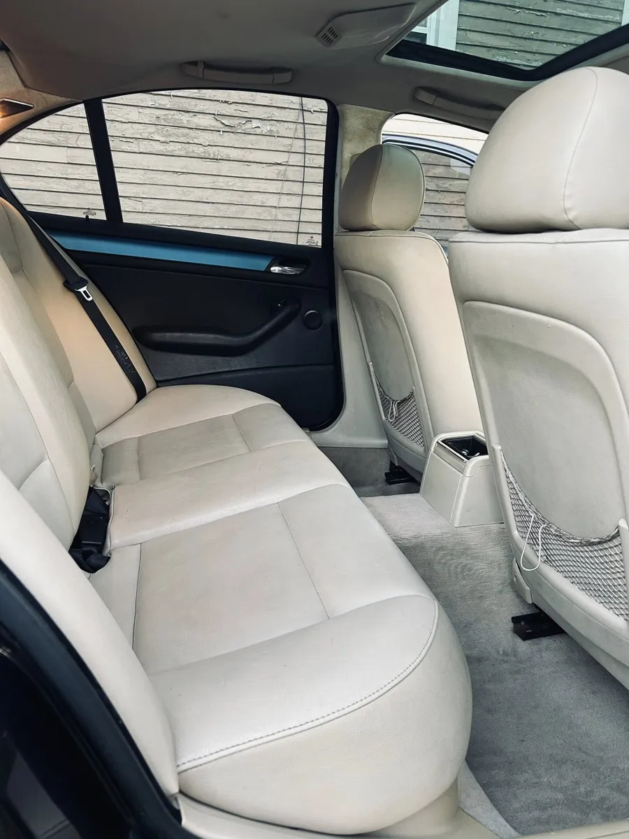 Tan leather BMW rear seats cleaned