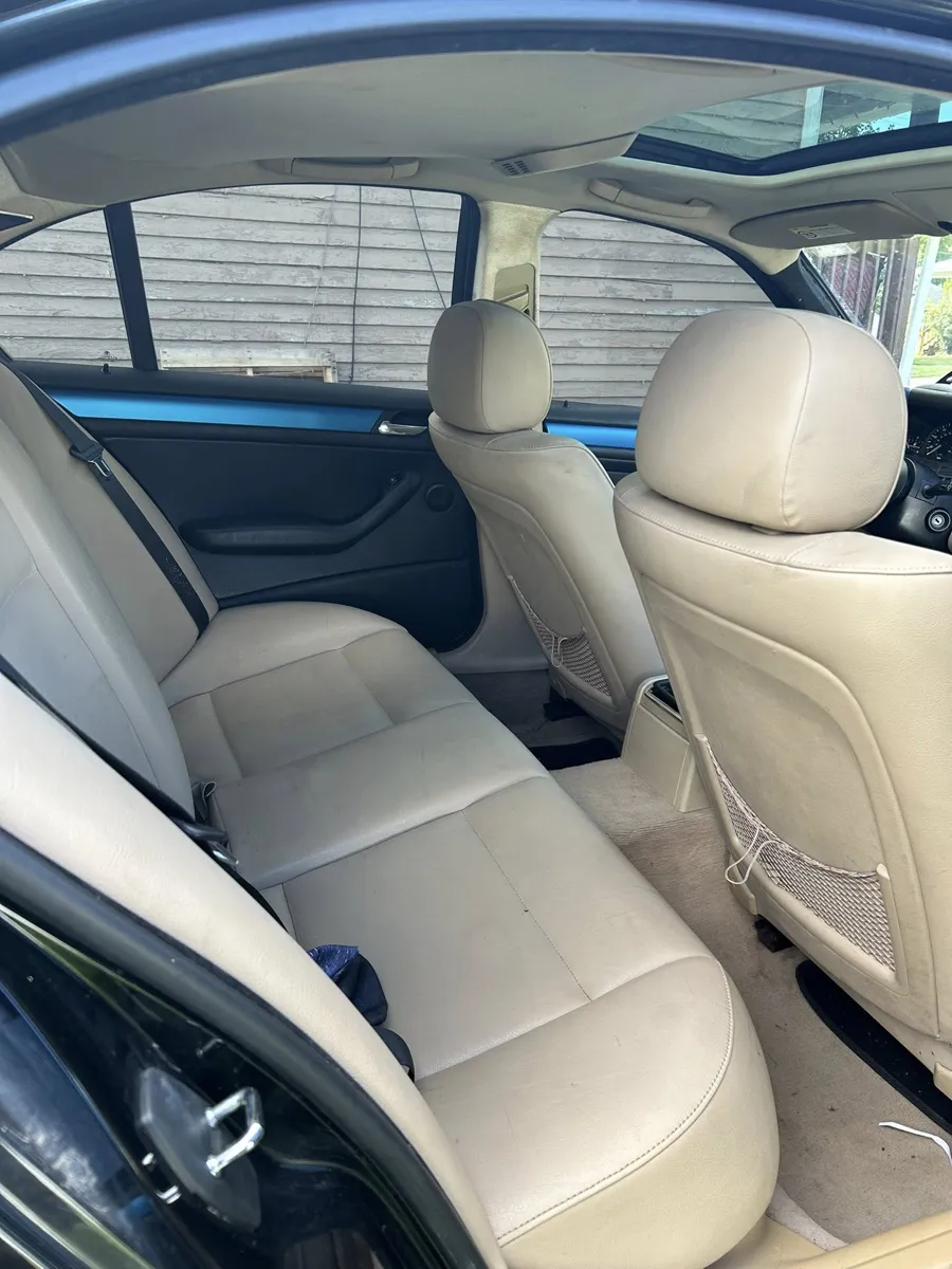 Tan leather BMW interior after a Vankham detail
