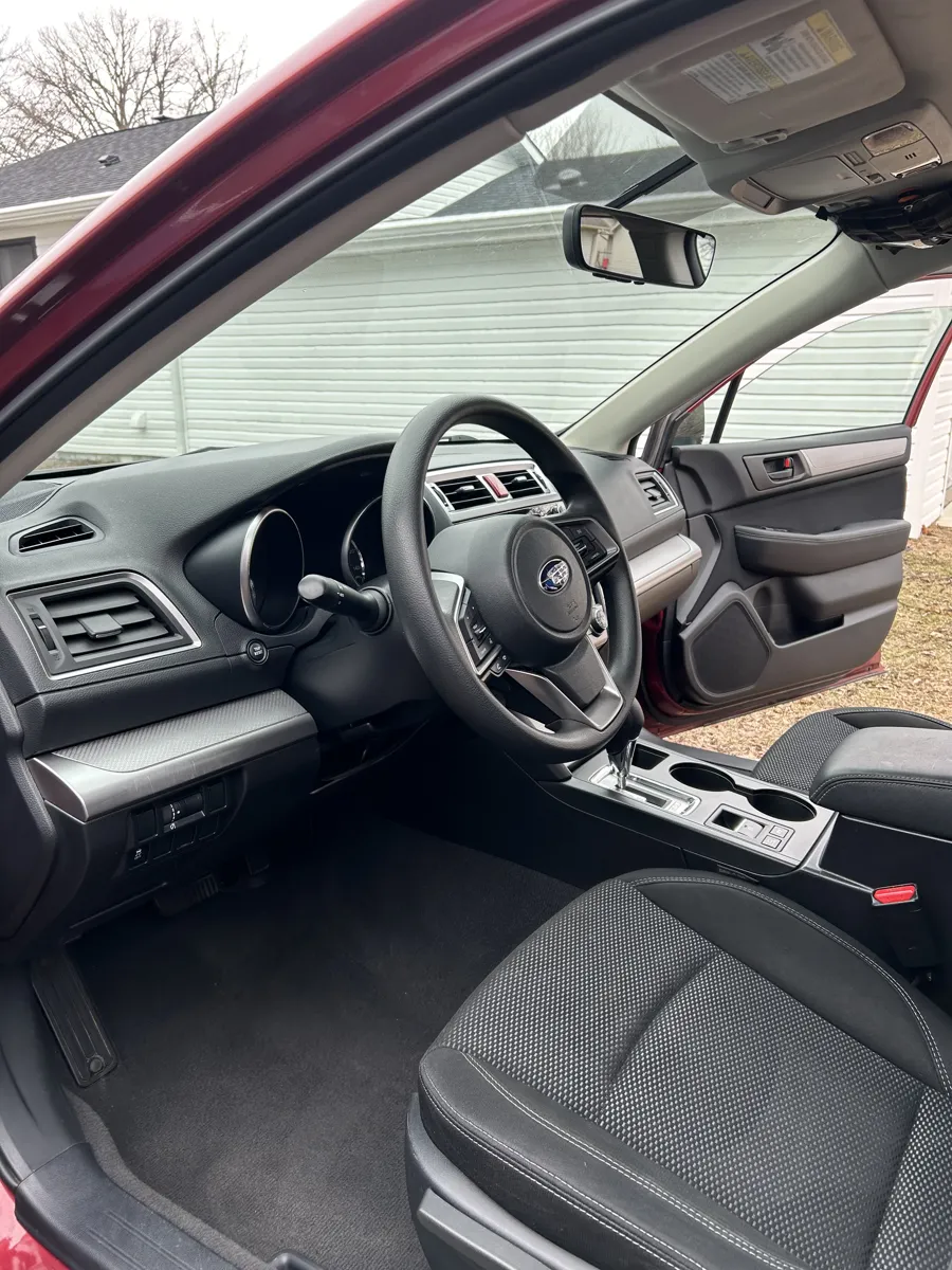 Red SUV front interior after an interior detail