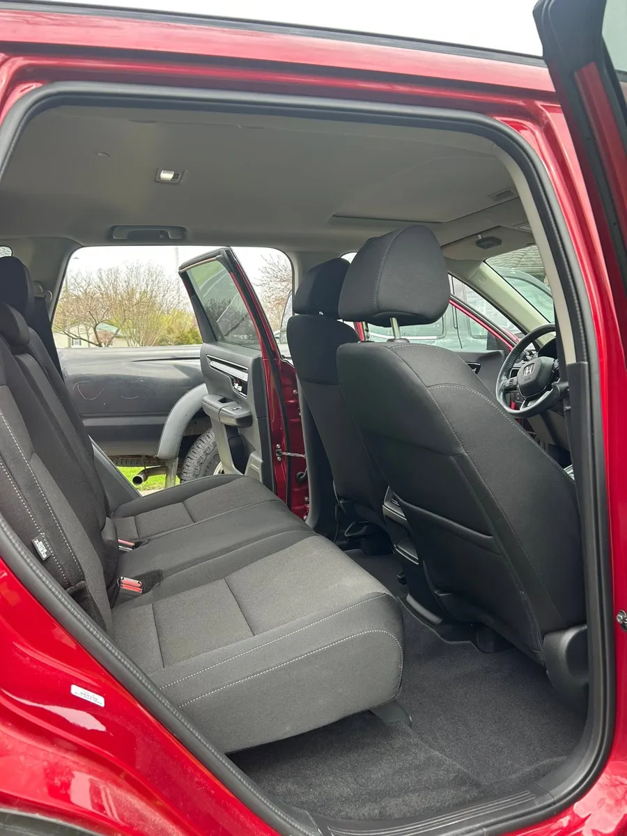 Red SUV rear seats after an interior detail